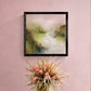 Ticked Pink by Gillian Lazanik, a framed textured landscape in soft pink, green, and earthy tones, displayed on a pink wall.