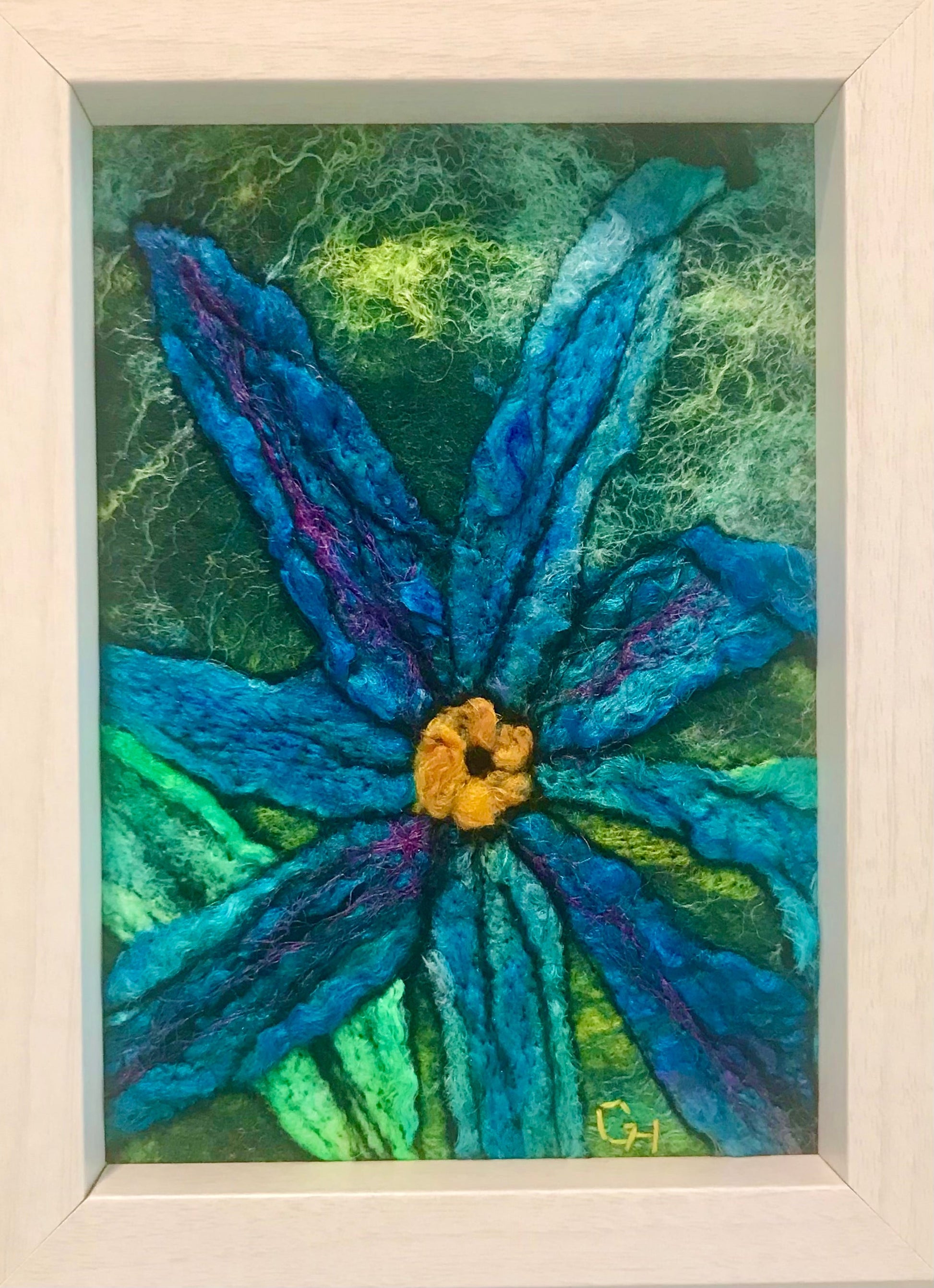 Blue Daisy – wet-felt fibre art by Gail Heinze, 4" x 6", framed